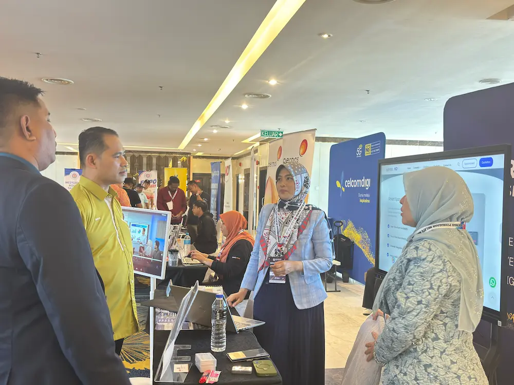 Arvia booth showcasing AI business solutions to delegates at the DPMM 57th Annual General Meeting in Kuantan, Malaysia