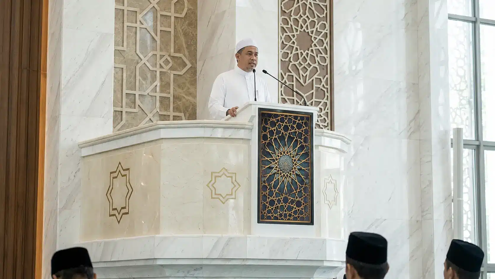 ARVIA Smart Podium integrated into an elevated khutbah area during Friday prayer in a Malaysian masjid