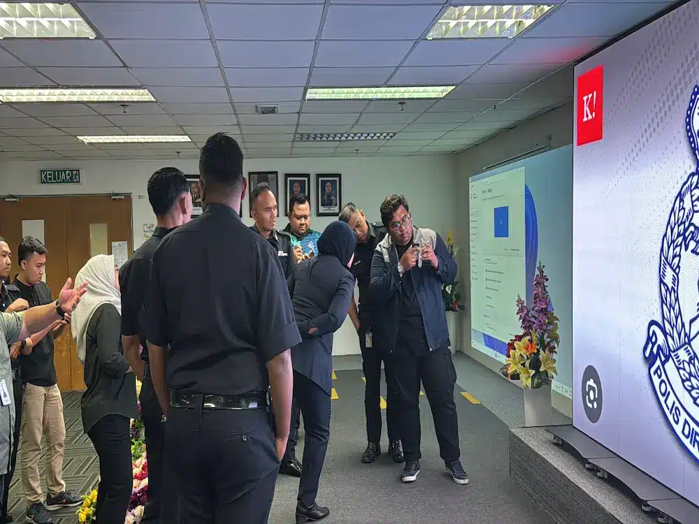 Five Arvia LED poster units forming a seamless display wall in a Malaysian government hall