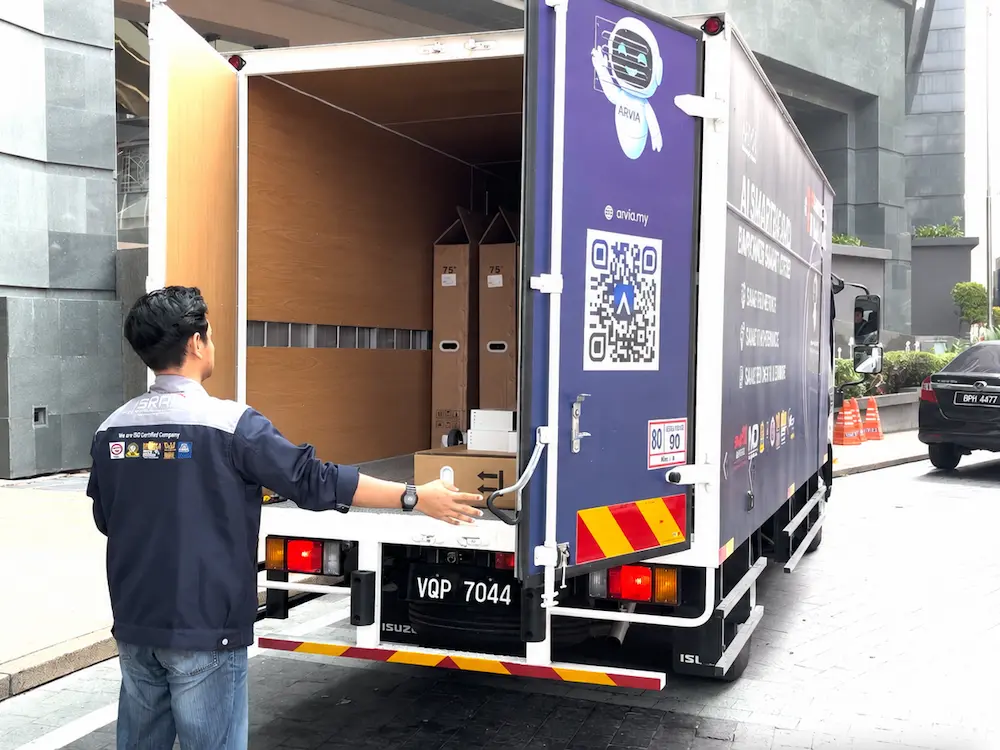 Arvia delivery lorry carrying 8 units of Smartboard AI Arvia Kementerian Digital