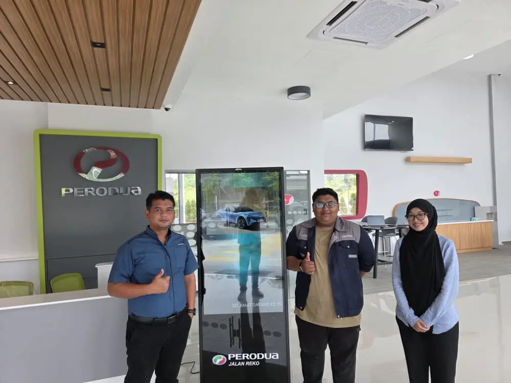 Arvia team with Perodua Jalan Reko staff after floor standing kiosk installation in Kajang, Selangor