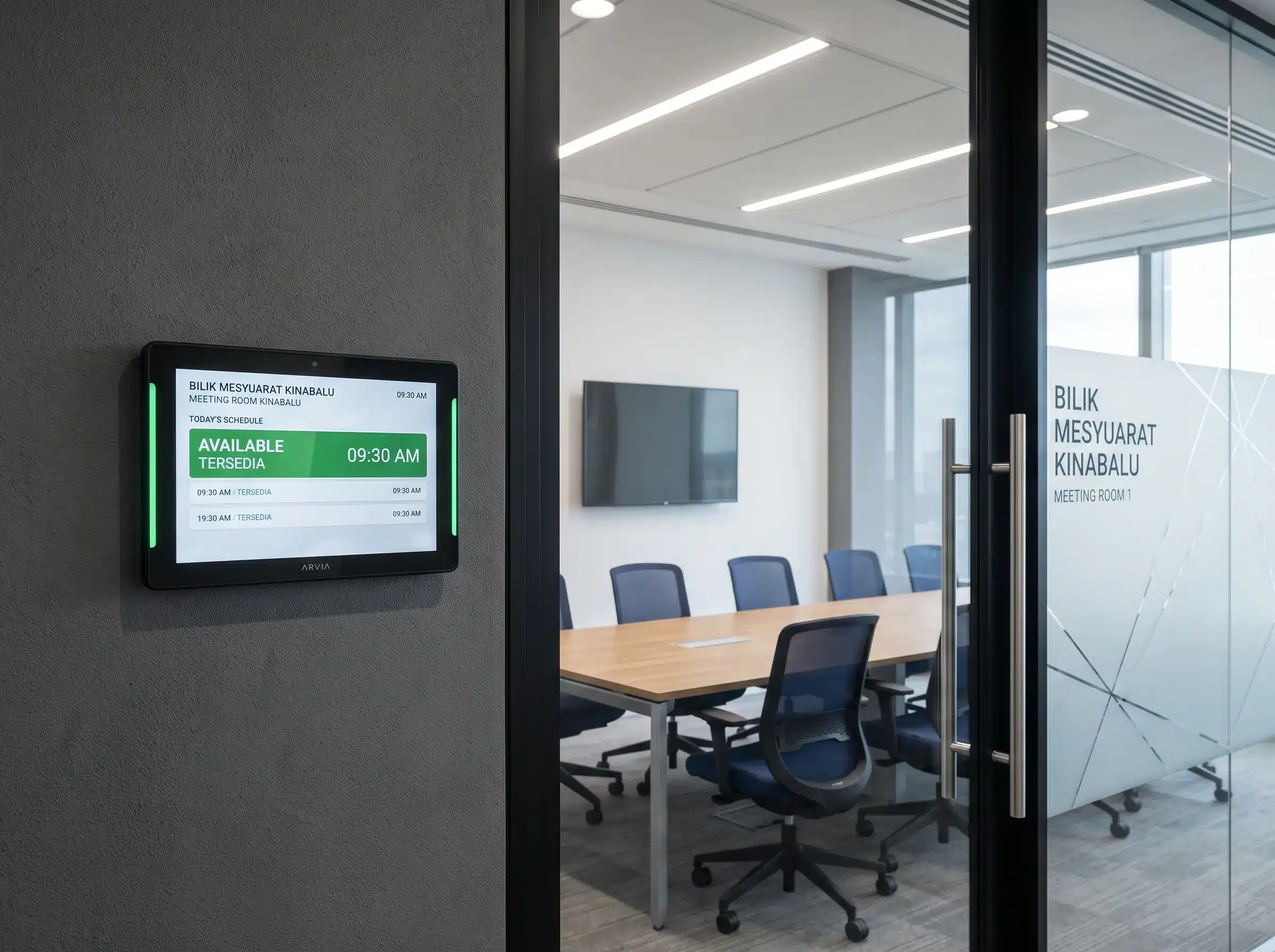 Arvia meeting room booking panel at a modern corporate office meeting room entrance in Malaysia