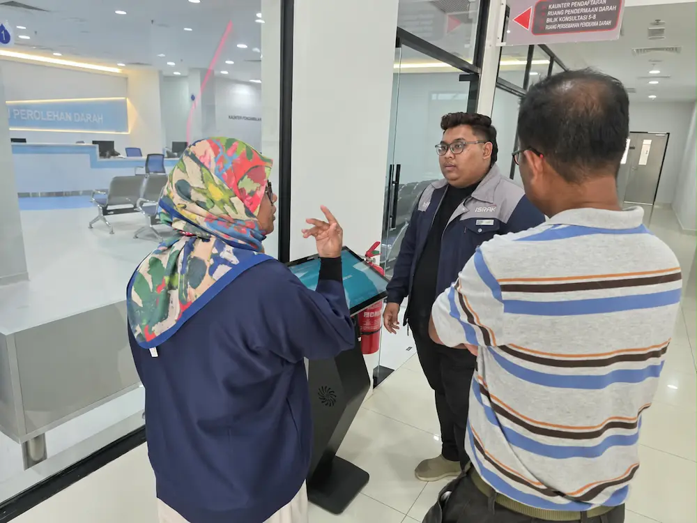 PDWU lobby in Kedah with the touchscreen monitor kiosk Kedah installation from Arvia